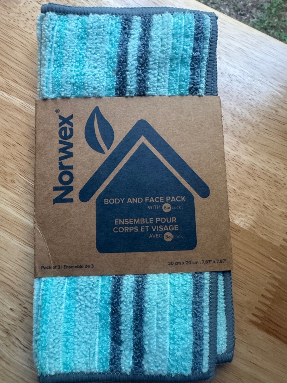 Norwex Turquoise and Gray Striped Body & Face Pack
